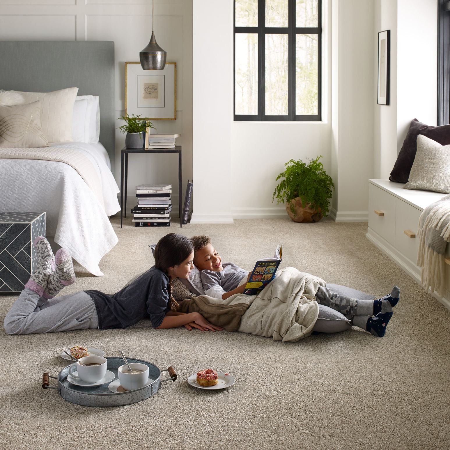 two children on floor - carpetilenet